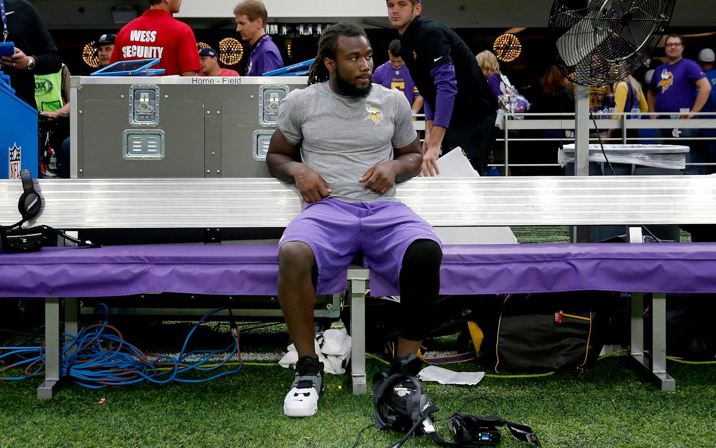 Vikings running back Dalvin Cook (33) sits on the bench at the end of the game against the Lions on Sunday. Cook left the game with an injury in the third quarter. The Vikings fear Cook suffered an injury to his left anterior cruciate ligament