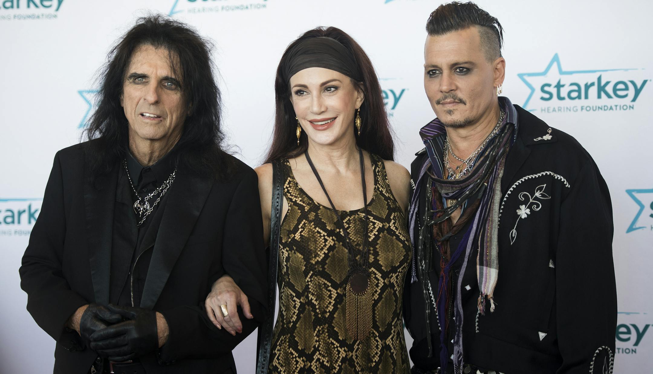 From left, musician Alice Cooper and his wife Sheryl Goddard posed with actor Johnny Depp on the red carpet at the River Centre in St. Paul, MN, on Sunday afternoon. ] Isaac Hale • isaac.hale@startribune.com The Starkey Hearing Foundation held a red carpet event and gala at the River Centre in St. Paul, MN, on Sunday, July 17, 2016.