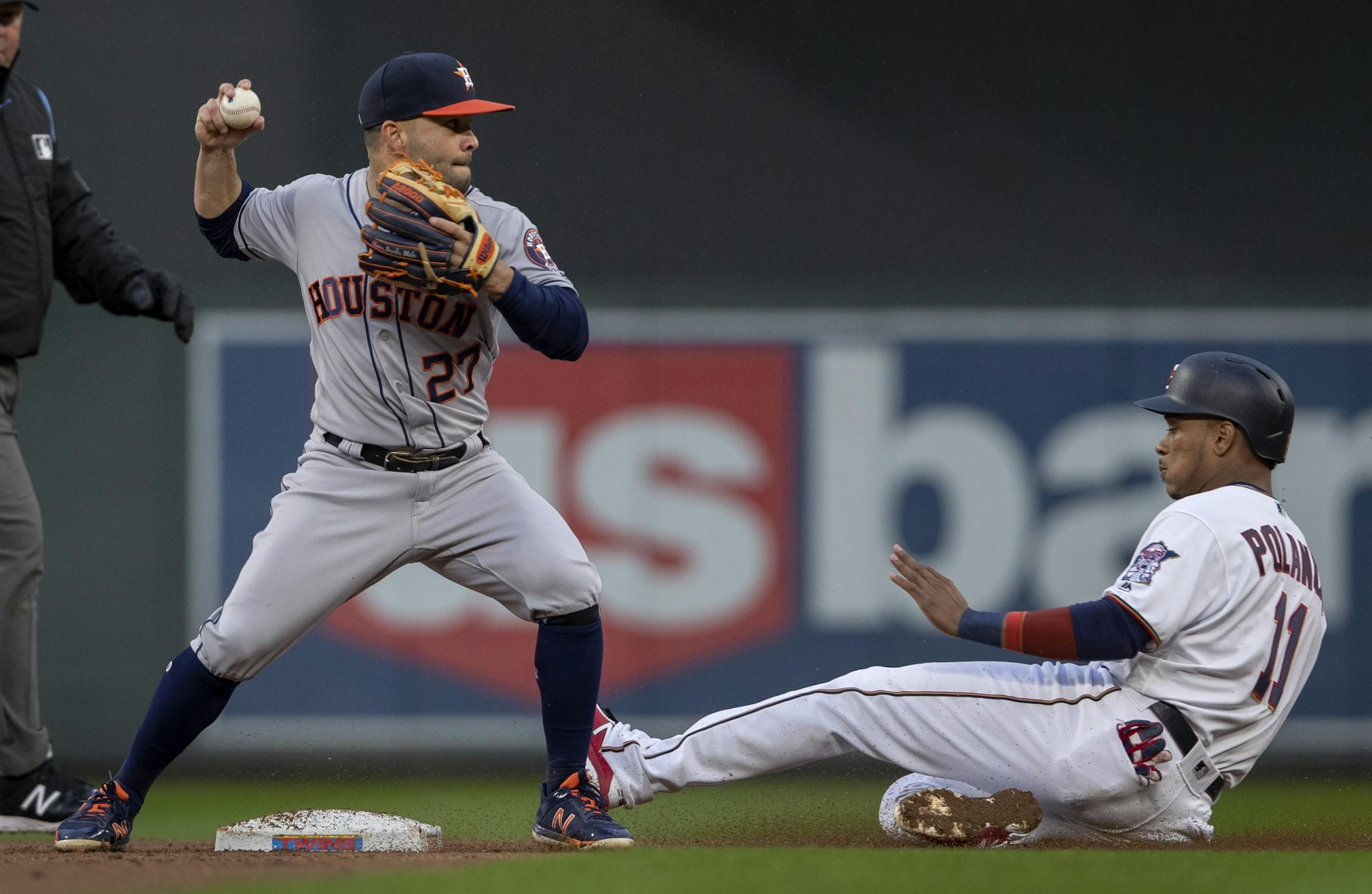 Houston Astros Jose Altuve turned a double play in the first inning.