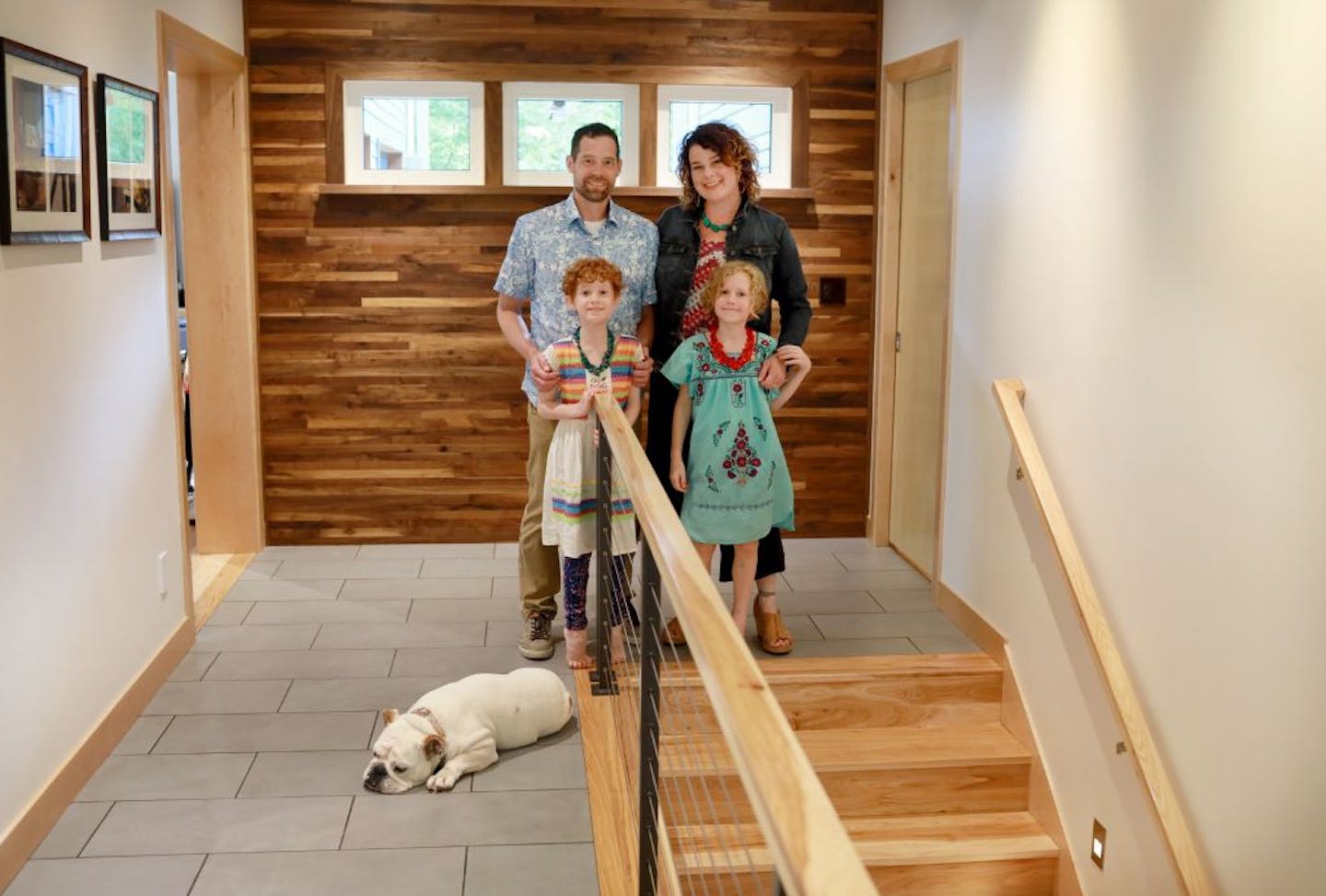 Jen and Scott Hanson of Golden Valley built a new house for themselves with an apartment for Jen's parents, too. The couple is with their 7-year-old twin daughters Zelie and Solveig, and Maggie their English bulldog.