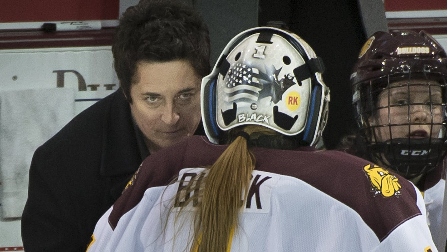 University of Minnesota Duluth head coach Shannon Miller talks with goalie Kayla Black (1) before an overtime shootout on Saturday night against the University of North Dakota. ] (Aaron Lavinsky | StarTribune) University of Minnesota Duluth told women's hockey head coach Shannon Miller that this season would be the las of her successful run as the Bulldog's coach. After five national championships, an NCAA record, and 11 Frozen Four Victories, Miller, the highest-paid coach in women's hockey, wa