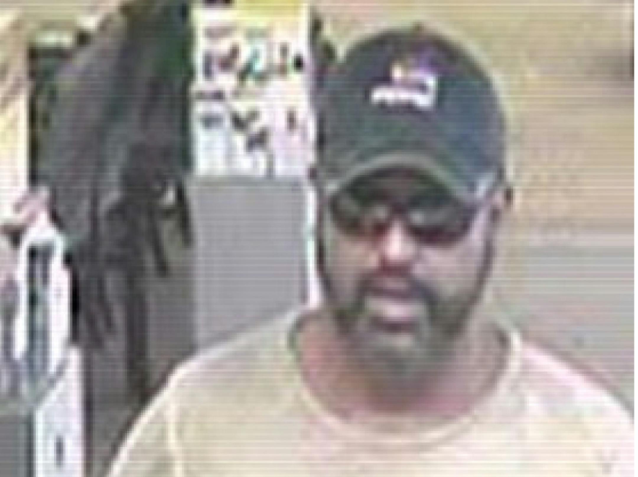 Blaine police say this image of the person who robbed a TCF Bank in Blaine matches the description of Lyle "Ty" Hoffman, wanted in connection with the killing of Kelly Phillips.