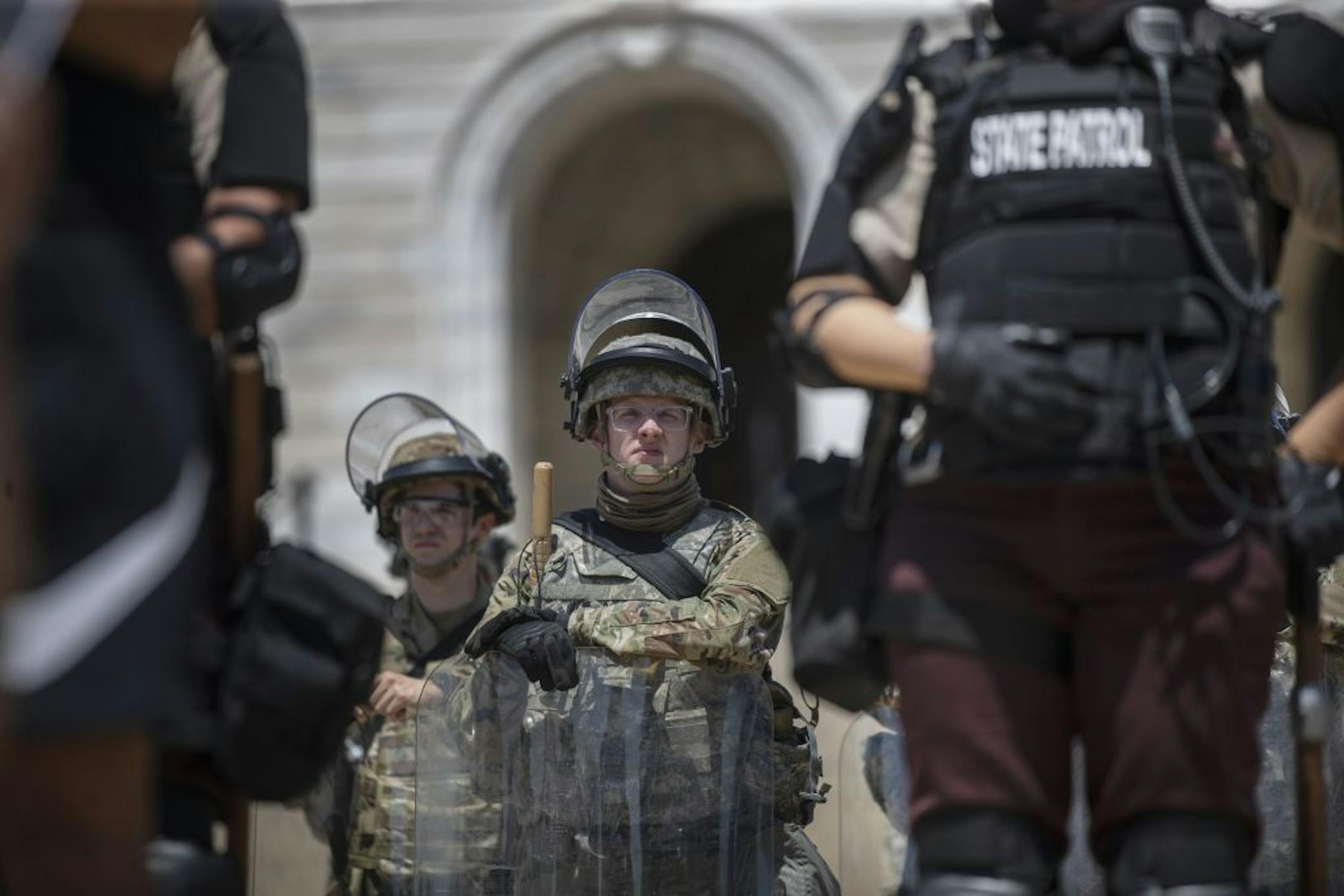 Minnesota National Guard members and State Patrol officers at the Capitol in St. Paul during a rally for justice for George Floyd on Sunday, May 31, 2020.