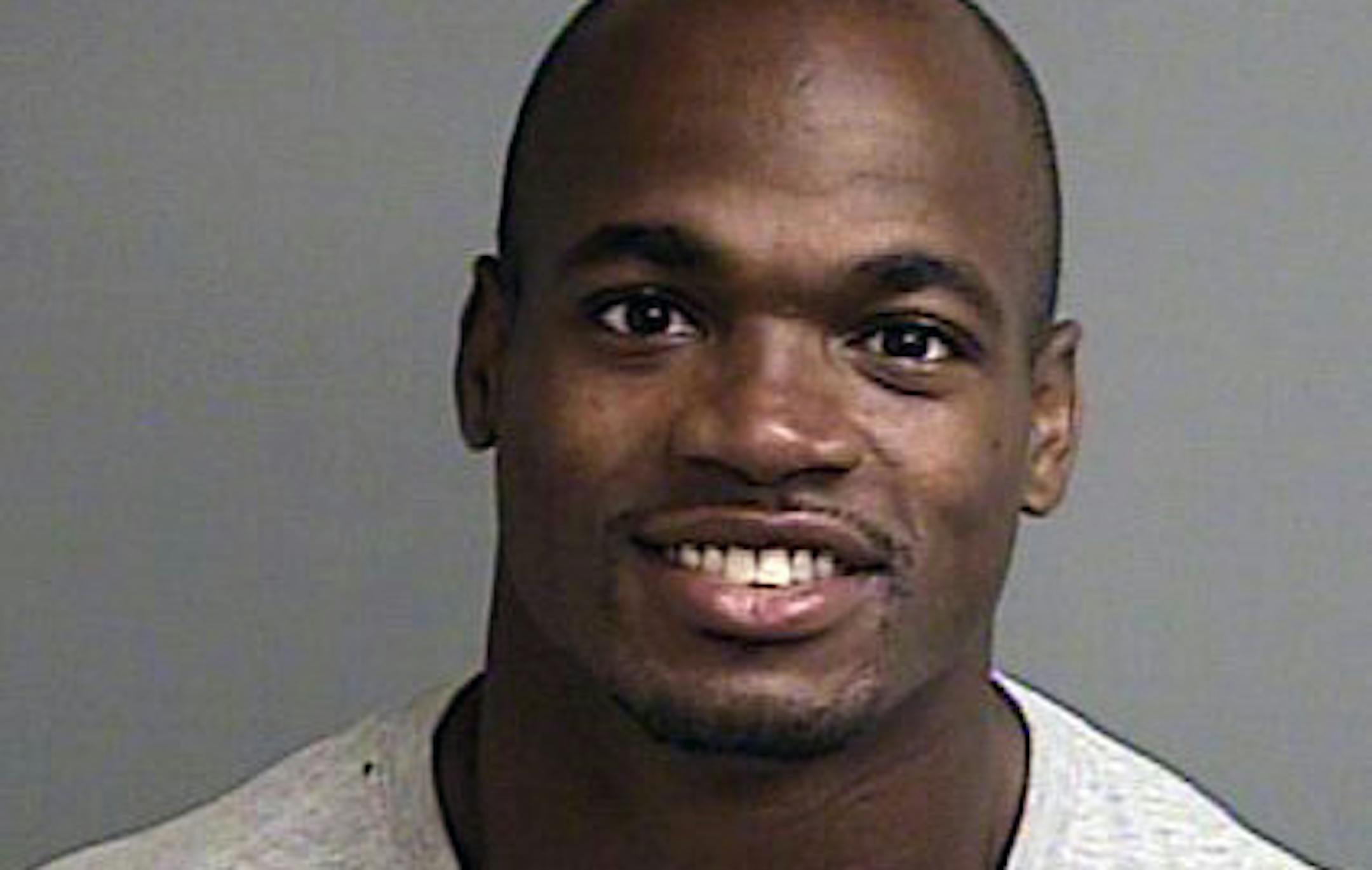 Adrian Peterson was booked into the Montgomery County jai, then released on bond on Sept. 13, 2014. (Mandatory credit > Provided by KHOU via Montgomery County Sheriff)