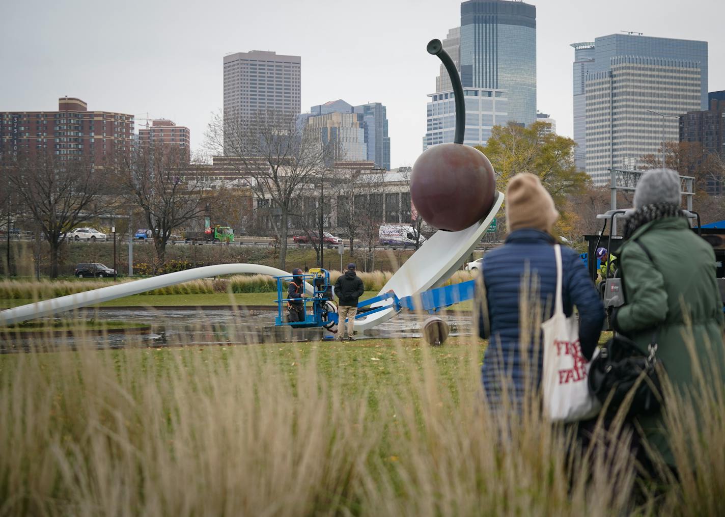 The 17500 pound aluminum cherry ball is unbolted, lifted, and separated from the Spoonbridge base it sits atop at the Sculpture Garden in Minneapolis, Minn., on Tuesday, Nov. 16, 2021. Due to the typically harsh conditions of Minnesota winters, this iconic Minneapolis fruit requires a fresh coat of paint about every ten years to keep the cherry's red crisp and glossy.  ] SHARI L. GROSS • shari.gross@startribune.com