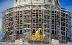 Scaffolding around the Capitol dome. ] GLEN STUBBE * gstubbe@startribune.com , Tuesday, May 19, 2015 Crews wasted no time clearing out furniture and a