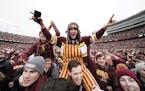 Gophers fans celebrated after their win over Penn State.