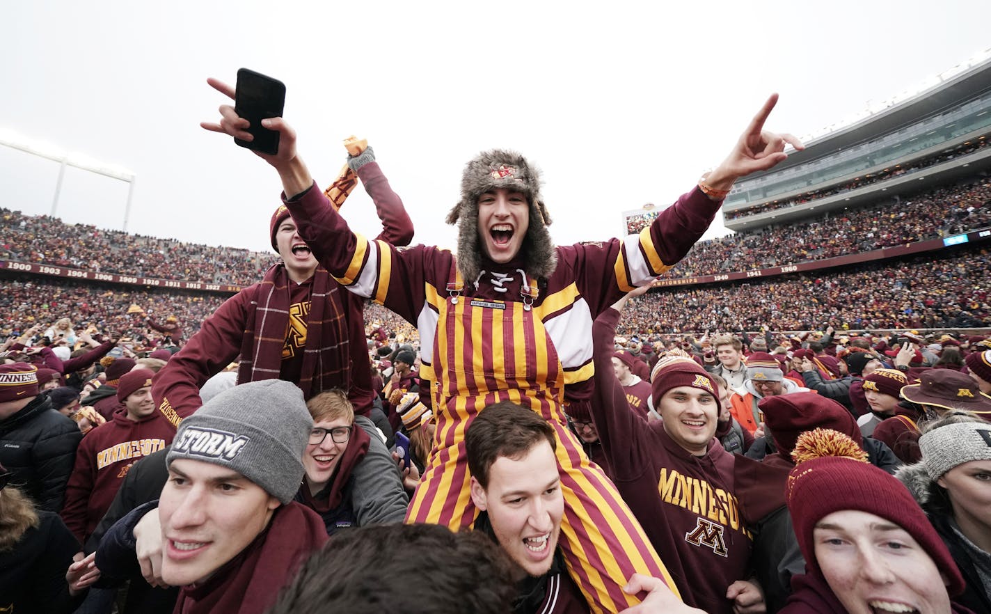 Gophers fans celebrated after their win over Penn State.