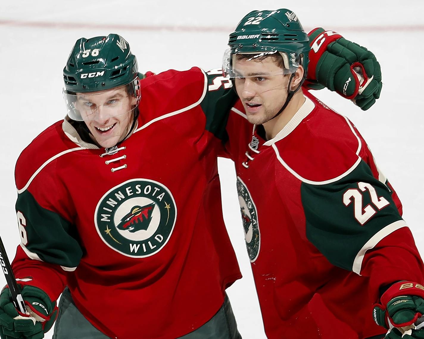 Erik Haula (56) and Nino Niederreiter (22) celebrated after a Haula a goal in the second period. ] CARLOS GONZALEZ cgonzalez@startribune.com - December 13, 2016, St. Paul, Minnesota, NHL Hockey, Xcel Energy Center, Minnesota Wild vs. Florida Panthers