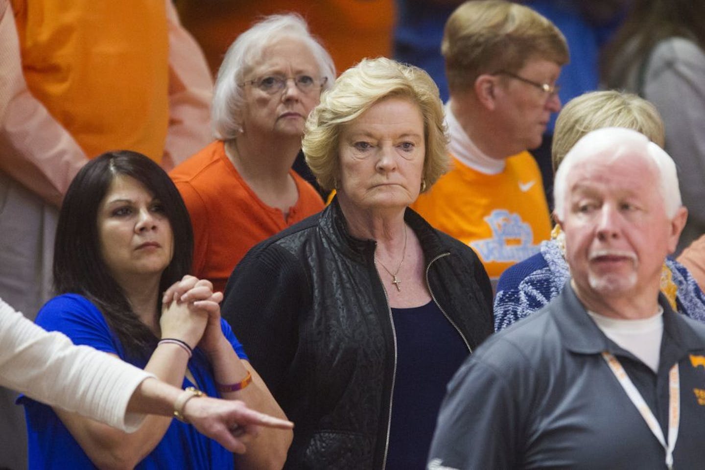 FILE - In this Jan. 31, 2016, file photo, former Tennessee women's basketball coach Pat Summitt, center, attends an NCAA college basketball game between Tennessee and Alabama in Knoxville, Tenn. Summitt, the winningest coach in Division I college basketball history who uplifted the women's game from obscurity to national prominence during her career at Tennessee, died Tuesday morning, June 28, 2016. She was 64. (Saul Young/Knoxville News Sentinel via AP, File) MANDATORY CREDIT