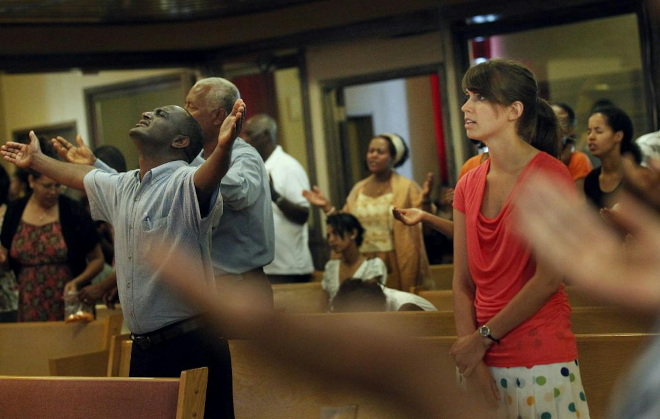 Sarah Koscielniak worshipped with members of an Ethiopian congregation, which meets at Central Mission church on Sunday July 01, 2012 in St. Paul, MN. .