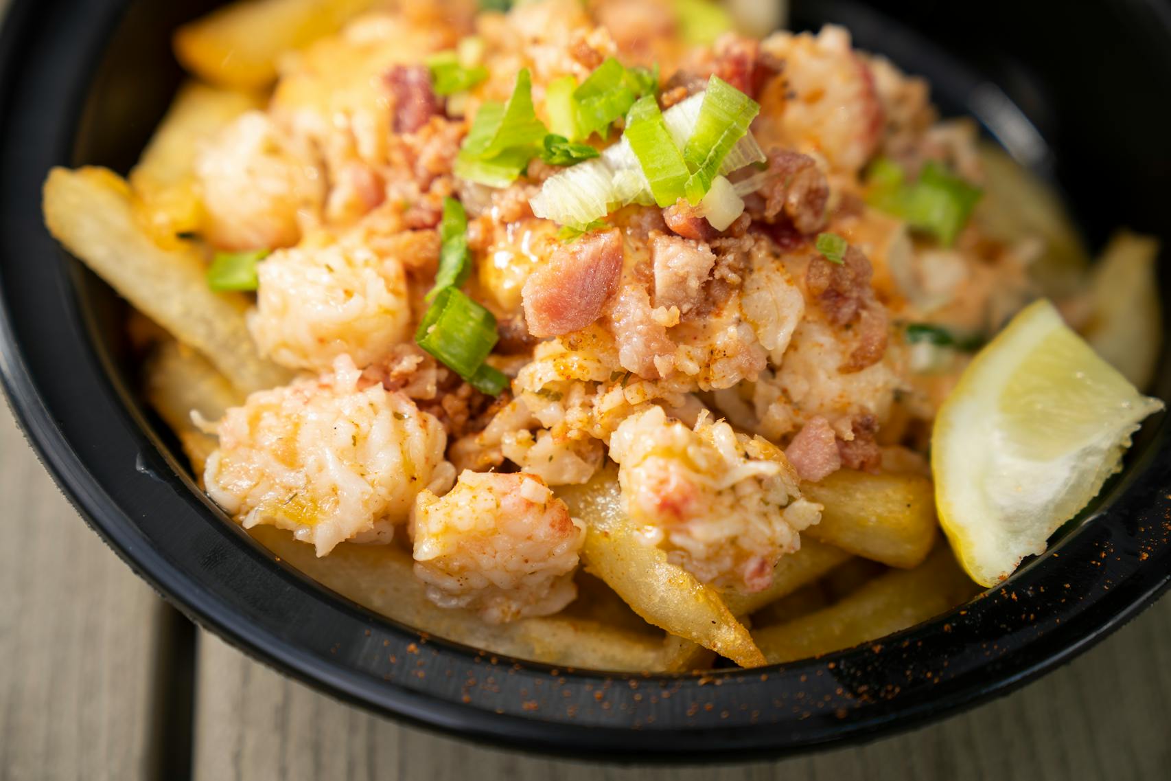 Loaded Lobster Fries from Cafe Caribe. The new foods of the 2023 Minnesota State Fair photographed on the first day of the fair in Falcon Heights, Minn. on Tuesday, Aug. 8, 2023. ] LEILA NAVIDI • leila.navidi@startribune.com