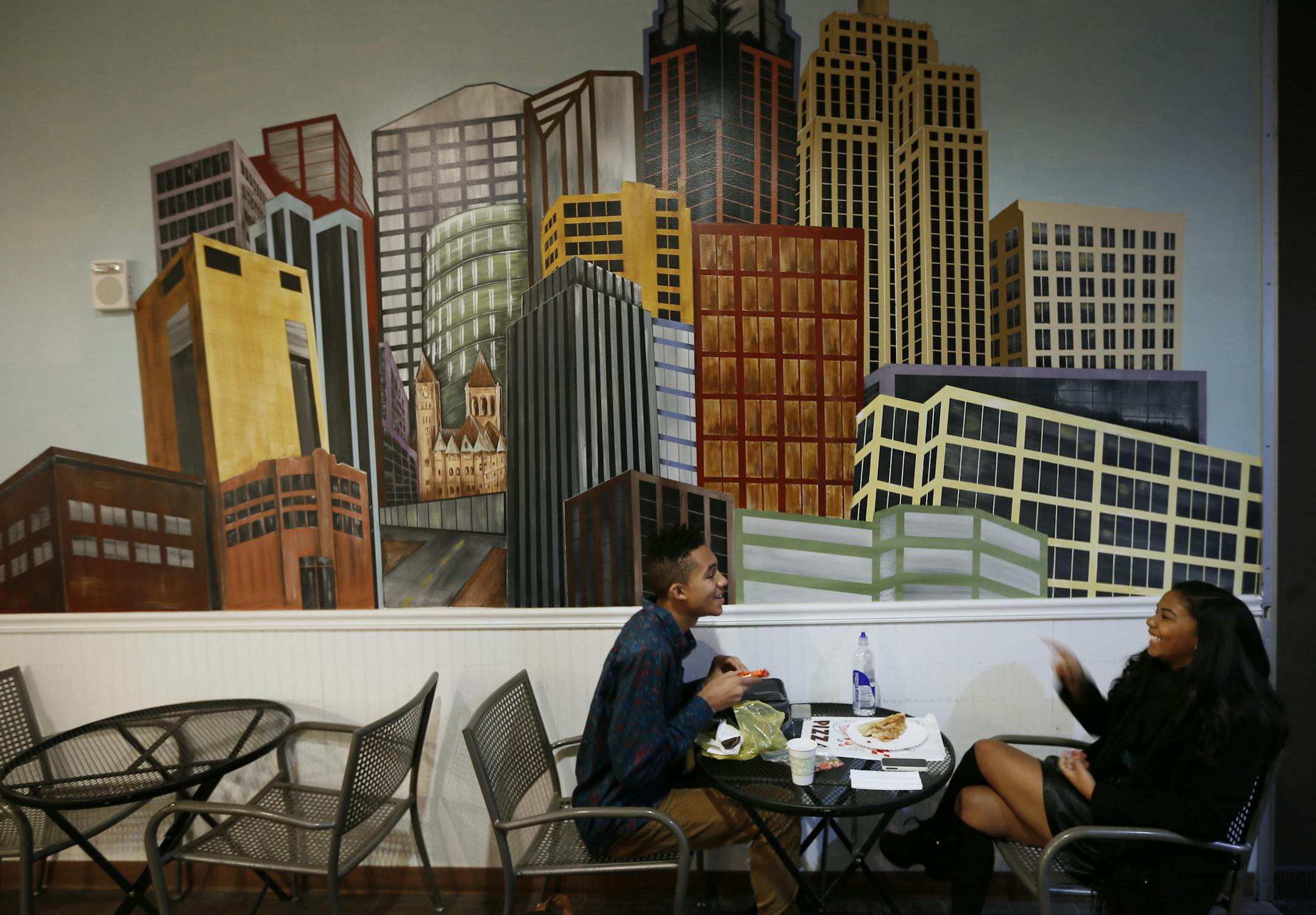 Jordan Naegele left and Macailah Maxwell ate lunch at pizza shop near their school in the skyway Thursday October 24, 2013 in St. Paul, MN.The St. Paul Conservatory for Performing Arts, which previously required students to go back and forth between the Lowry and Landmark Center on Rice Park, invested in a full makeover of the Lowry's public spaces, a move that brought about a late start to the school year.] JERRY HOLT ‚Ä¢ jerry.holt@startribune.com