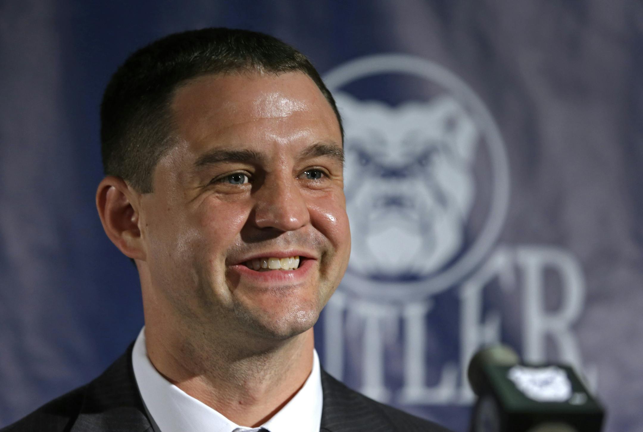 Brandon Miller talks about being named men's basketball coach at Butler, during an announcement in Indianapolis, Saturday, July 6, 2013. Miller, a former Butler point guard and assistant coach, replaces Brad Stevens, who left Butler to become head coach of the Boston Celtics. (AP Photo/Michael Conroy)
