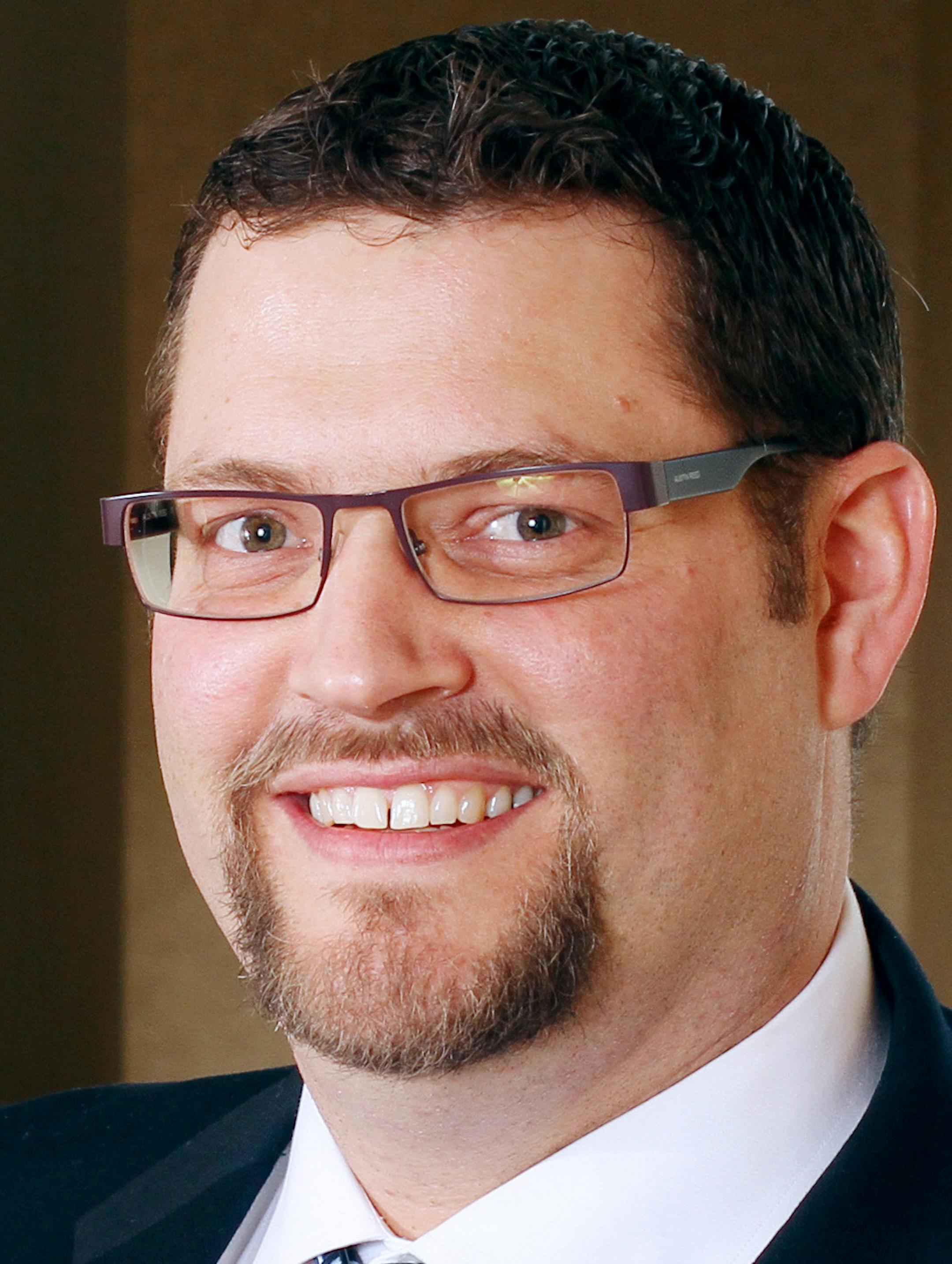 Environmental portrait of Kristian Mortenson taken on Friday, March 8, 2013 on the St. Paul campus of the University of St. Thomas.