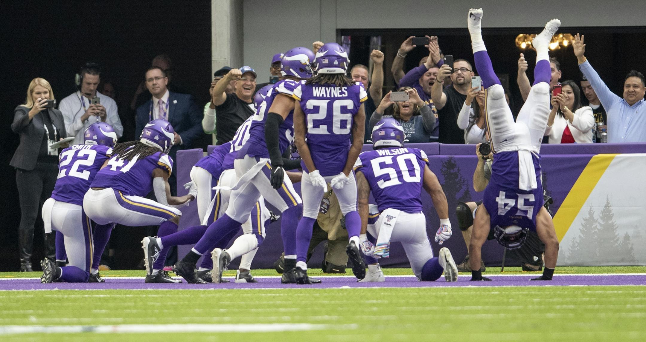 Minnesota defense celebrated in the Eagles end zone in the fourth quarter.