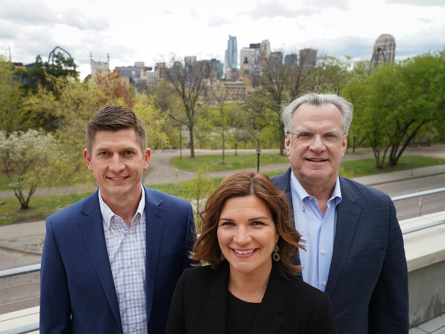 Founder Kelly Doran (right) has stepped down as CEO of Doran Cos. and sold 51 percent of his ownership to new CEO Anne Behrendt and 24.5 percent to Chief Financial Officer Ryan Johnson, both veterans of the development-construction-management firm. They were photographed last week on the pool deck of the Mill and Main luxury apartment building in the historic St. Anthony Falls district of Minneapolis. Photo: Shari L. Gross &#x2022; shari.gross@startribune.com