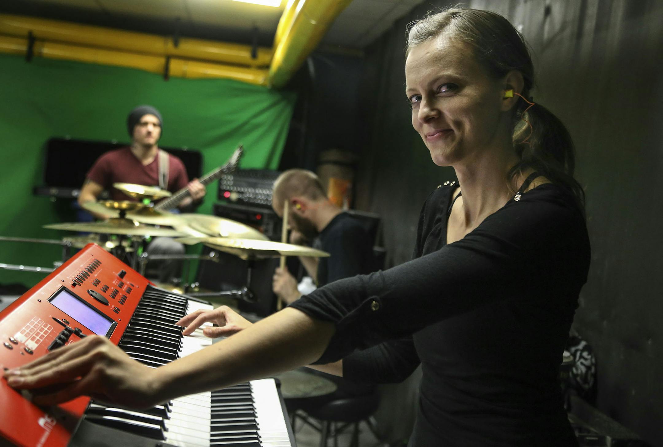 Millennial Tori Siitari used to work at an industrial control panel company west of the Twin Cities. She made good money but decided personal happiness was more important so she left her job to pursue her love of music and now bar tends for the flexibility and to pay the bills. She was seen rehearsing with the metal band Immoralis she is a member of Saturday, Nov. 22, 2014, at their rehearsal space in downtown St. Paul, MN.](DAVID JOLES/STARTRIBUNE)djoles@startribune There is no economic statist