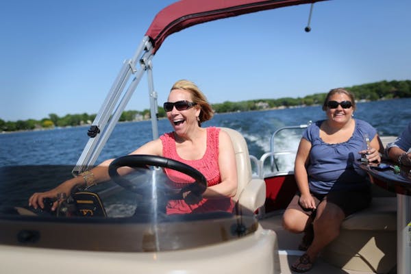 Chris Dicke, left, and Amanda Blotsky enjoyed a recent "ladies-only" afternoon on Prior Lake. The friends regularly rent boats through Your Boat Club.