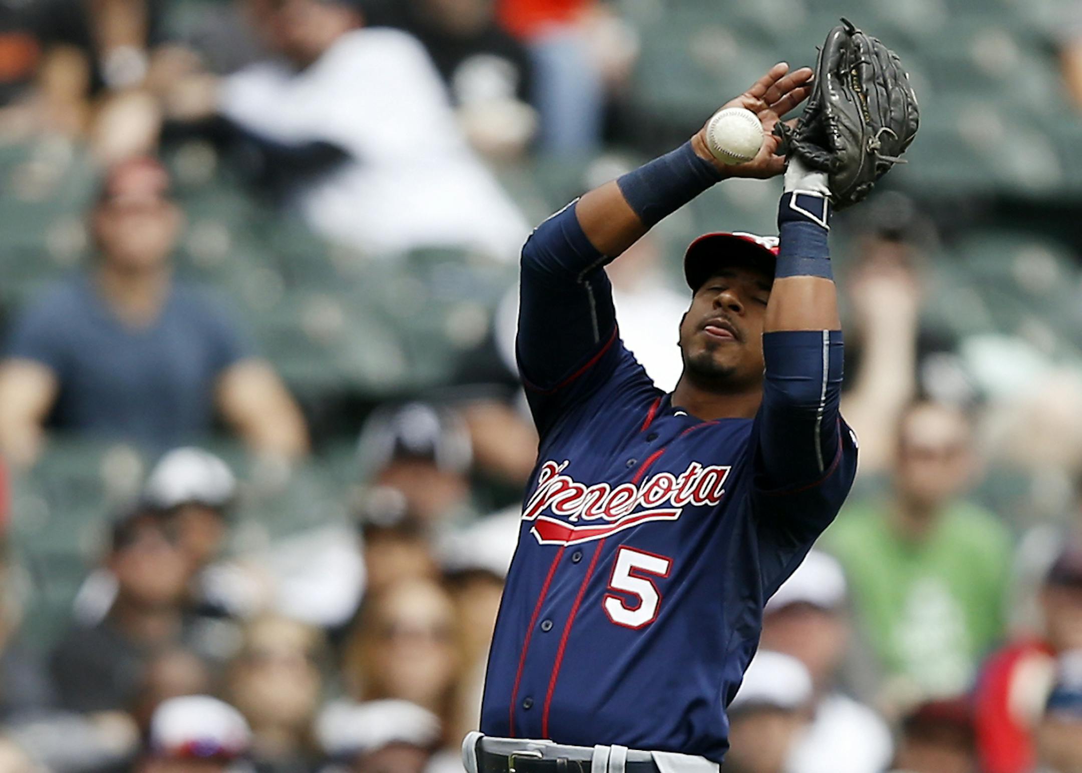 Twins third baseman Eduardo Escobar dropped the ball for an error, allowing White Sox left fielder Melky Cabrera to reach first base, during the second inning Sunday in Chicago.