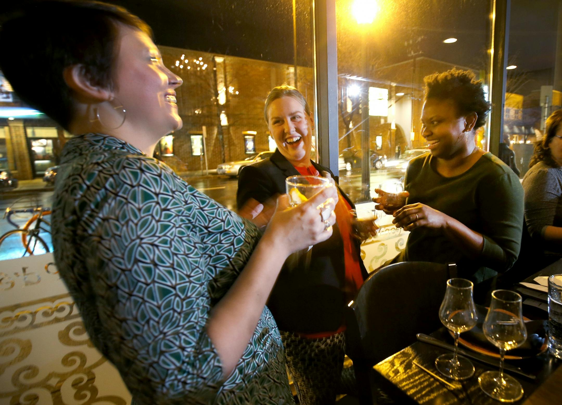 Hayley Matthews-Jones, Molly Clark and Nichole Macintosh all of Minneapolis joked during a recent meeting of Women Who Whiskey coup d'etat in Minneapolis.