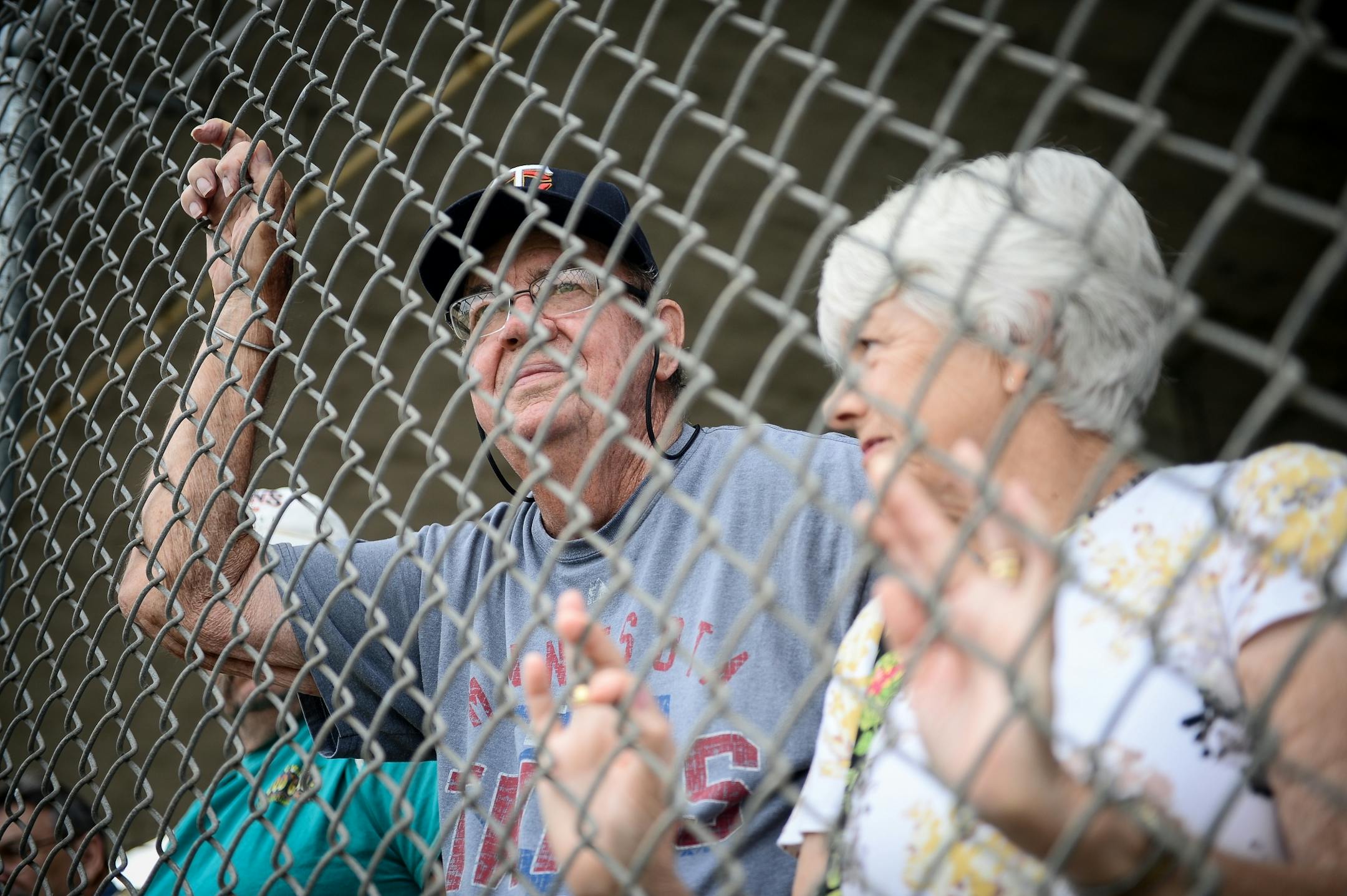 Steve and Dianne Smith, snowbirds from Victoria, Minn., watched infielders practice Tuesday morning.