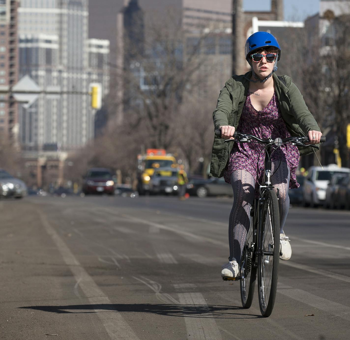 A biker rides south on Portland Avenue in Minneapolis on Friday, March 13, 2015. ] LEILA NAVIDI leila.navidi@startribune.com /