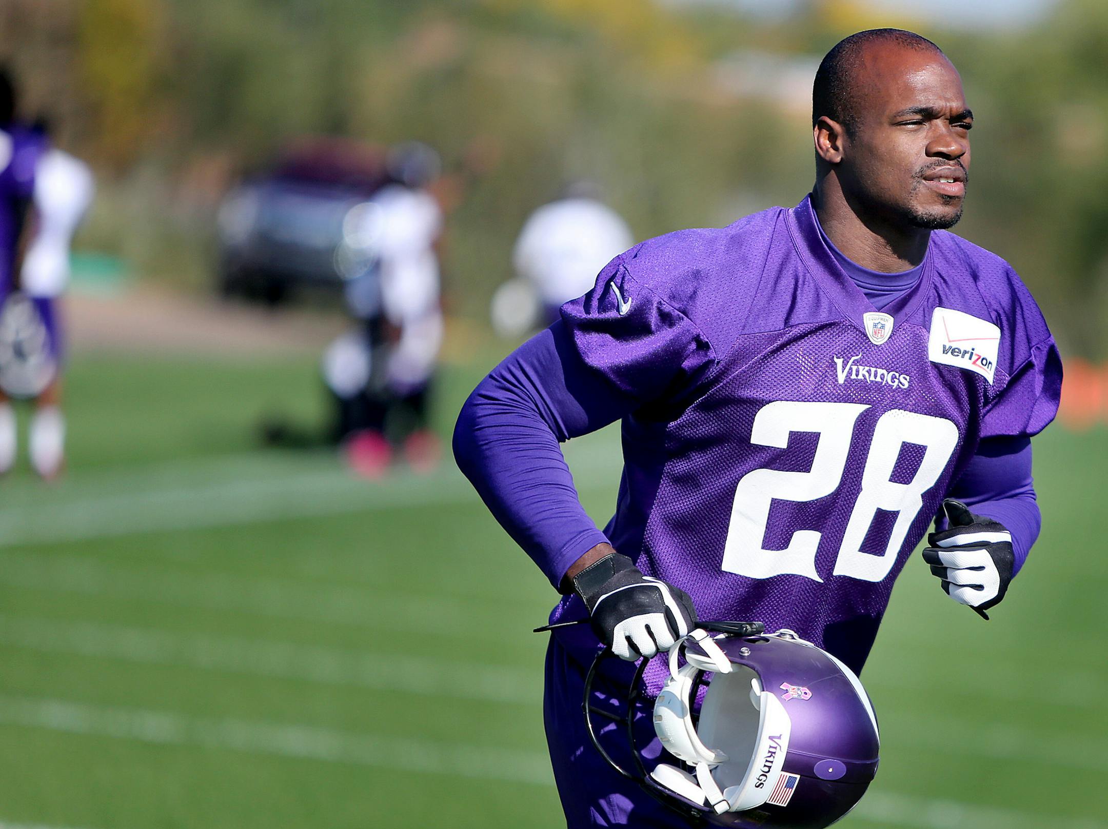 Minnesota Vikings Adrian Peterson made his way off the field during practice at Winter Park, Friday, October 11, 2013 in Eden Prairie, MN. Person's 2-year-old son was badly beaten and on life support in Sioux Falls, S.D. (ELIZABETH FLORES/STAR TRIBUNE) ELIZABETH FLORES • eflores@startribune.com