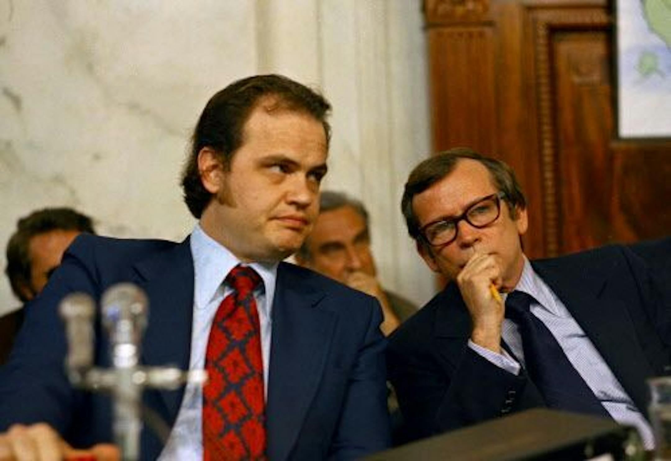 FILE - This May 17, 1973 file photo shows Sen. Fred D. Thompson, Chief Minority Counsel of the Senate Watergate Committee, left, talking with Sen. Howard Baker, R-Tenn. during the Watergate hearings on Capitol Hill in Washington.