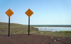 The Polymet tailings ponds could be seen over a small berm. ] ANTHONY SOUFFLE &#x2022; anthony.souffle@startribune.com Jon Cherry, President, CEO and 