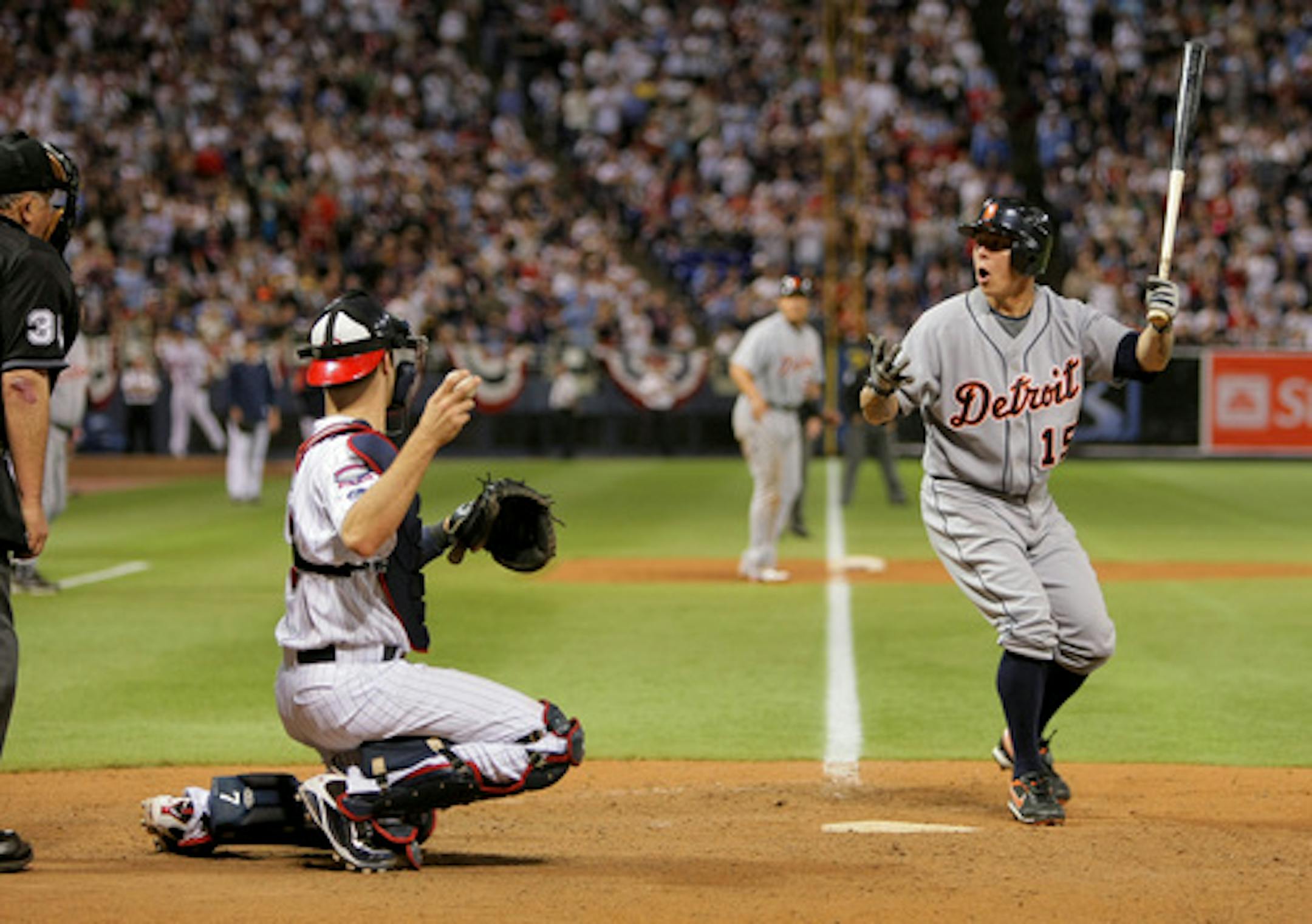 BRIAN PETERSON ¥ brianp@startribune.com Minneapolis, MN - 10/06/2009  Minnesota Twins -vs- Detroit Tigers  (One Game tiebreaker for the division title) ] Detroit Tigers Brandon Inge, with his shirt bloused out, gets hit by a pitch in the top of the 12th inning with bases loaded and looks back to umpire Randy March for the call.  But the  Tigers didn't get the call they felt they should have gotten in the top of the 12th when a pitch hit Brandon Inge in the shirt with the bases loaded. And wasn't called. Plate umpire Randy March didn't see it, didn't hear it -- but most importantly, didn't call it. "I did not have the ball hitting him," said Marsh after the run the Twins scored in the 12th turned out to be the winning run Tuesday night, instead of the tying run or perhaps one that merely reduced the Tigers lead. After all, there's no telling what might have happened if Marsh had said, yes, the pitch hit Inge.