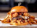 The Penny Poutine Burger at Piggy Bank in Uptown Minneapolis.