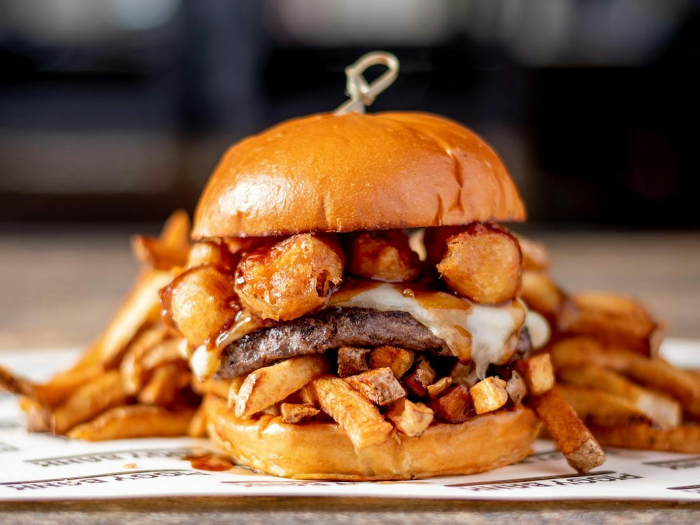 The Penny Poutine Burger at Piggy Bank in Uptown Minneapolis.