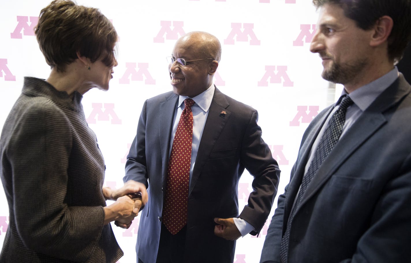 Garry W. Jenkins, dean of the U of M Law School, greeted Kathleen Blatz, chair of the board of directors for the Robina Foundation.