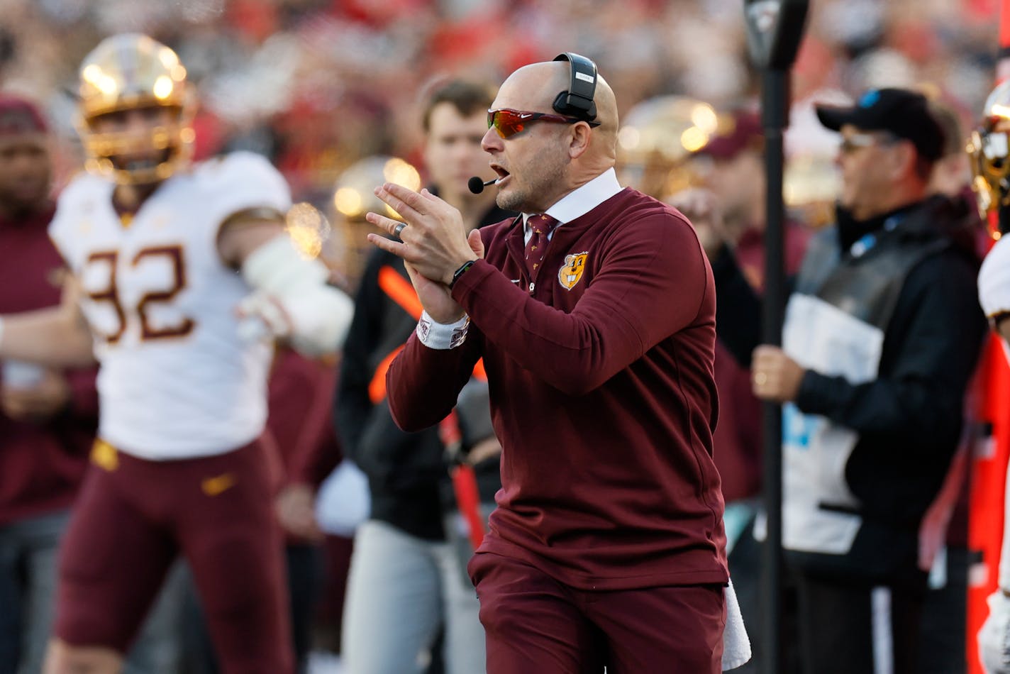 Minnesota head coach P.J. Fleck instructs his team against Ohio State during the first half of an NCAA college football game Saturday, Nov. 18, 2023, in Columbus, Ohio. (AP Photo/Jay LaPrete)