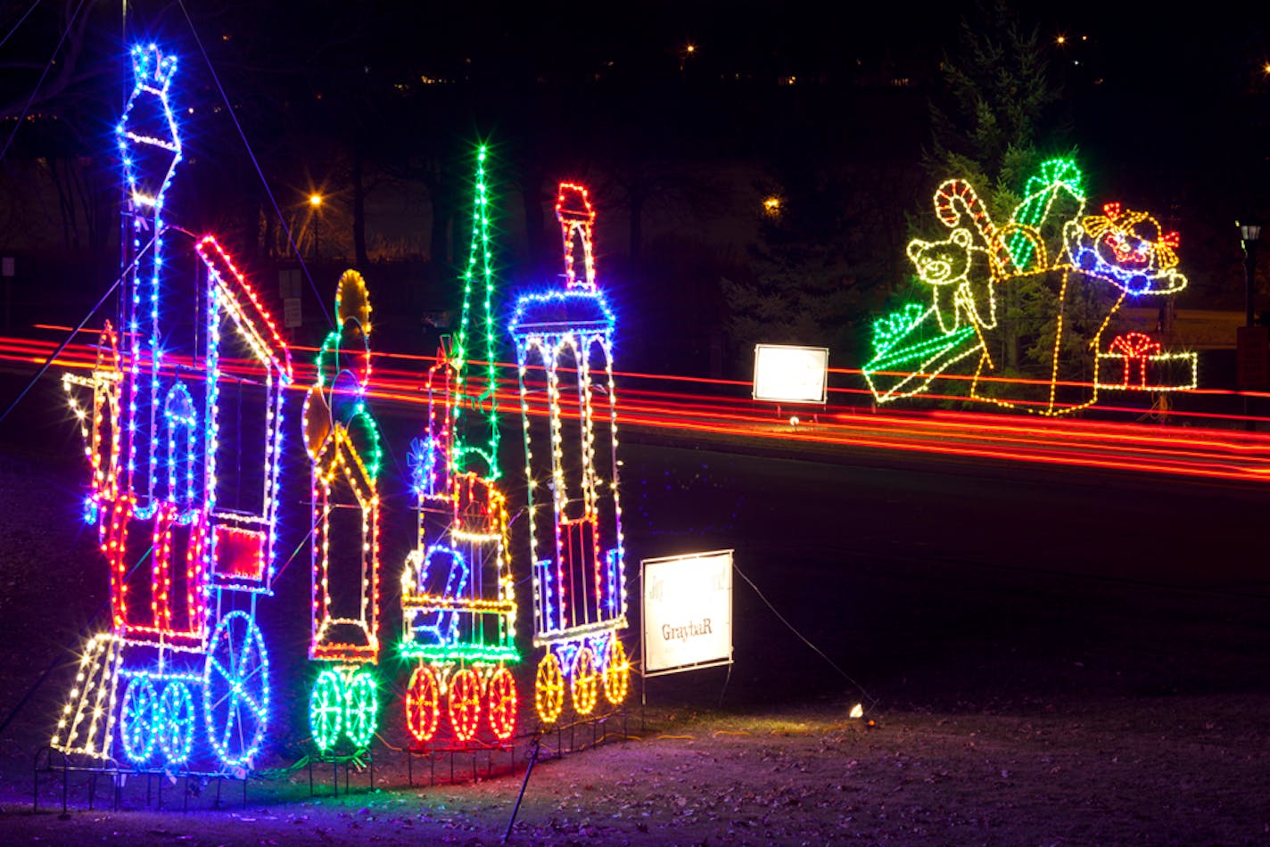 Passing cars created a light show of their own while viewing the the annual International Brotherhood of Electrical Workers Holiday Lights in the Park event in Phalen Park