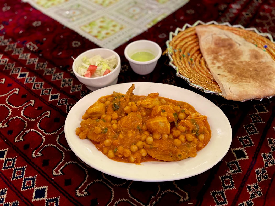 A hearty mix of garbanzo beans and chicken in a warmly spiced curry.