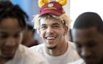 Jarvis Omersa wore a small Gophers hat while waiting for the NCAA tournament announcements with teammates at the Athletes Village. ] CARLOS GONZALEZ &