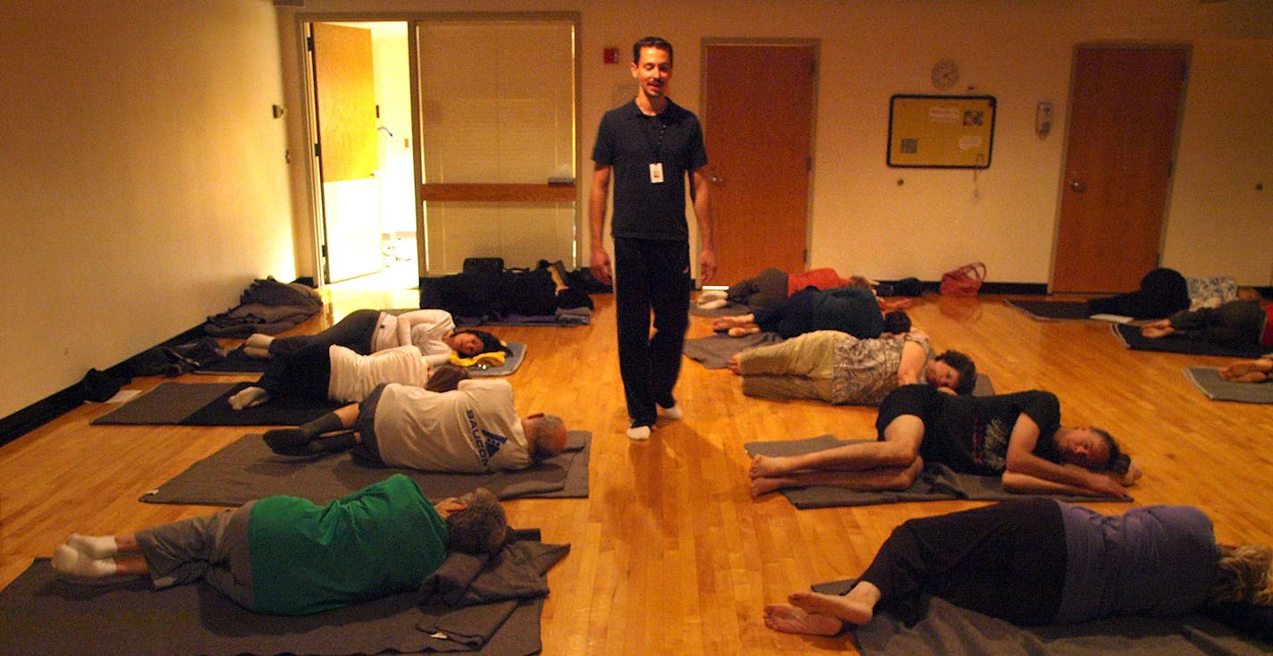 Provided photo Nick Strauss-Klein, director of Twin Cities Feldenkrais, teaches a class in Feldenkrais, an integrative practice that uses slow movement to increase flexibility.