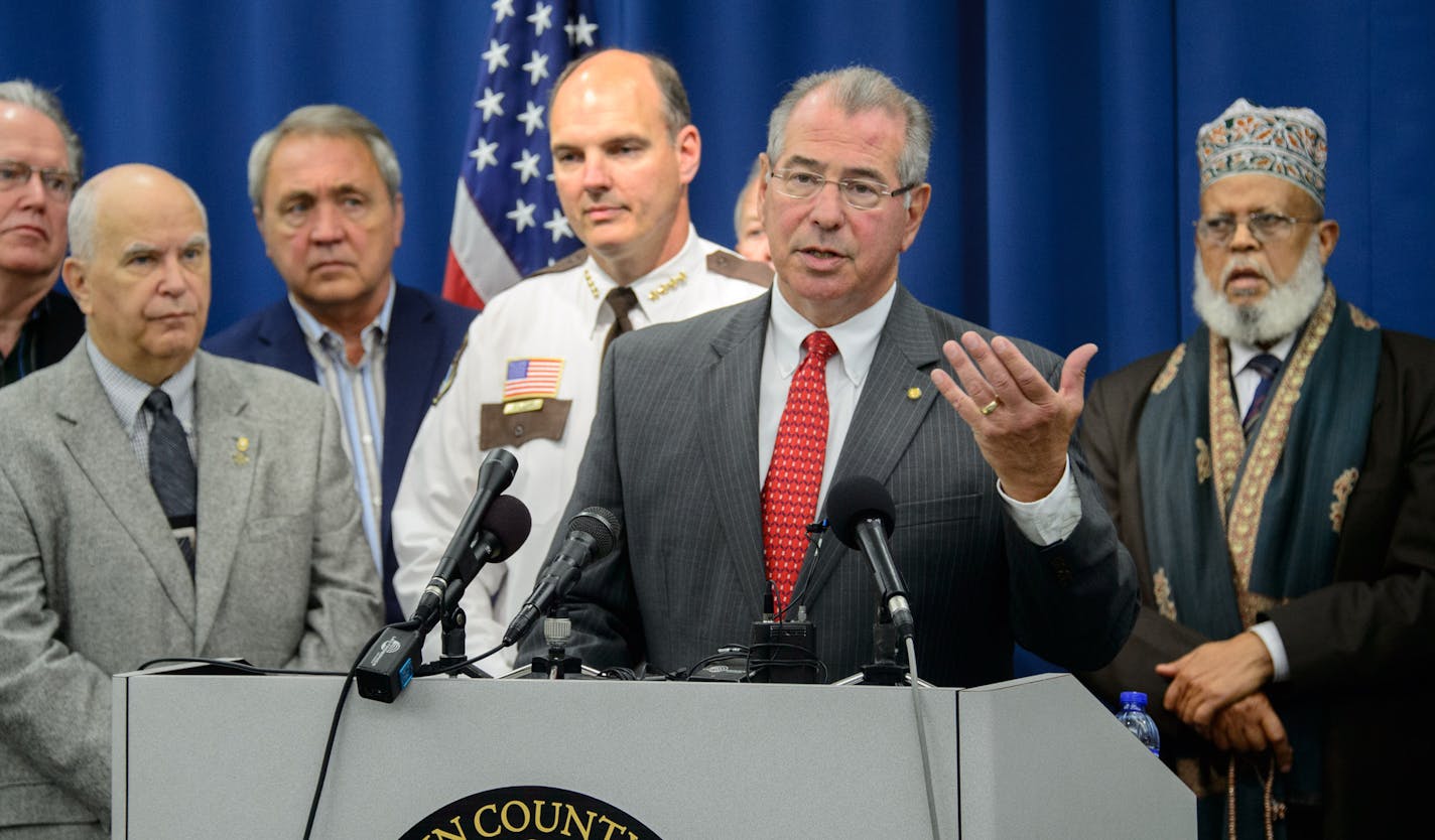 Hennepin County Sheriff Rich Stanek announced today that he will no longer honor U.S. Immigration and Customs Enforcement (ICE) detainers to hold individuals up to 48 hours. He was accompanied by Hennepin County Attorney Mike Freeman and members of the Sheriff's Office Community Advisory Board. Wednesday June 11, 2014 ] GLEN STUBBE * gstubbe@startribune.com