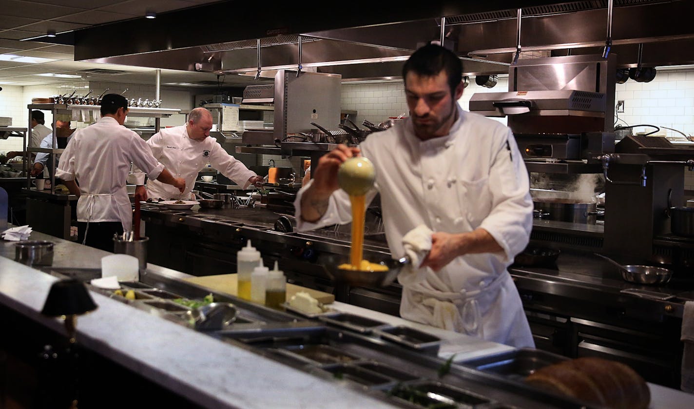 Brasserie Zentral is a restaurant in downtown Minneapolis, located in the Soo Line Building, that features cuisine from "from Eastern France, though Belgium, Switzerland and Germany, through Austria, Hungary, Northern Italy and more," according the restaurant's web site. Russell Klein (second from left) is chef-owner of the establishment.