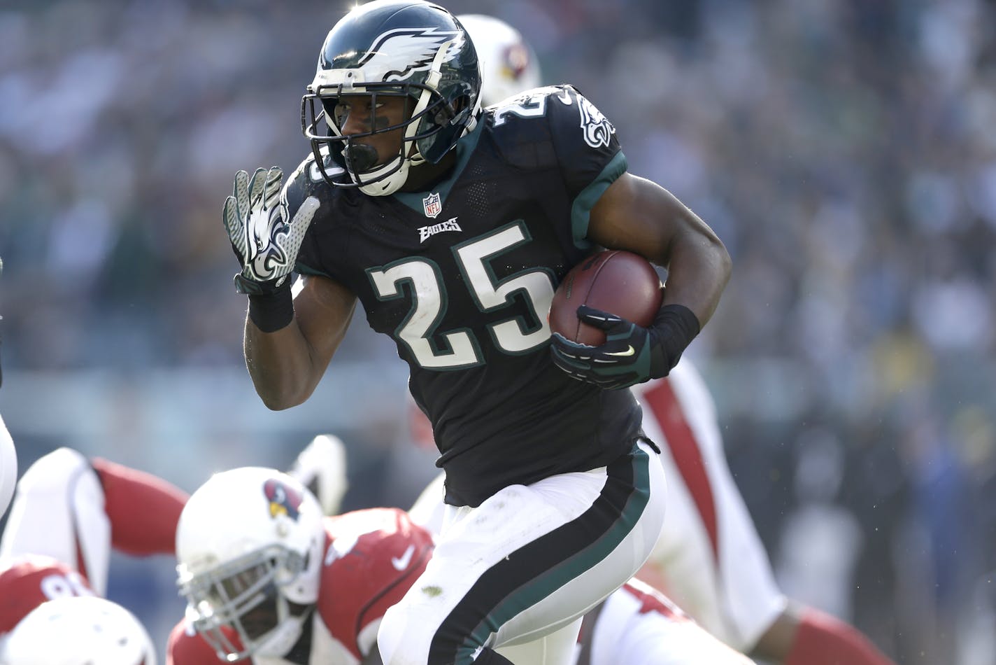 Philadelphia Eagles' LeSean McCoy carries the ball during the first half of an NFL football game, Sunday, Dec. 1, 2013, in Philadelphia. (AP Photo/Matt Rourke)