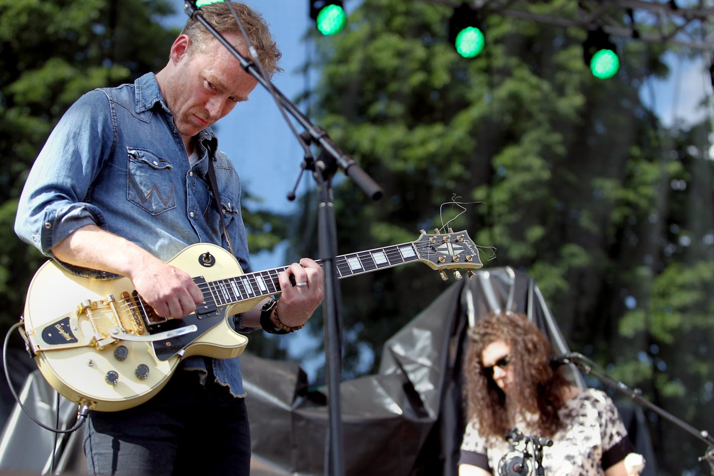 Alan Sparhawk and Mimi Parker, of the Duluth-native band Low, perform at the Rock the Garden concert at the Walker Art Center/Minneapolis Sculpture Garden on Saturday, June 15, 2013. The event featured Dan Deacon, Low, Bob Mould Band, Silversun Pickups and headliner Metric. ] (ANNA REED/STAR TRIBUNE) anna.reed@startribune.com (cq)