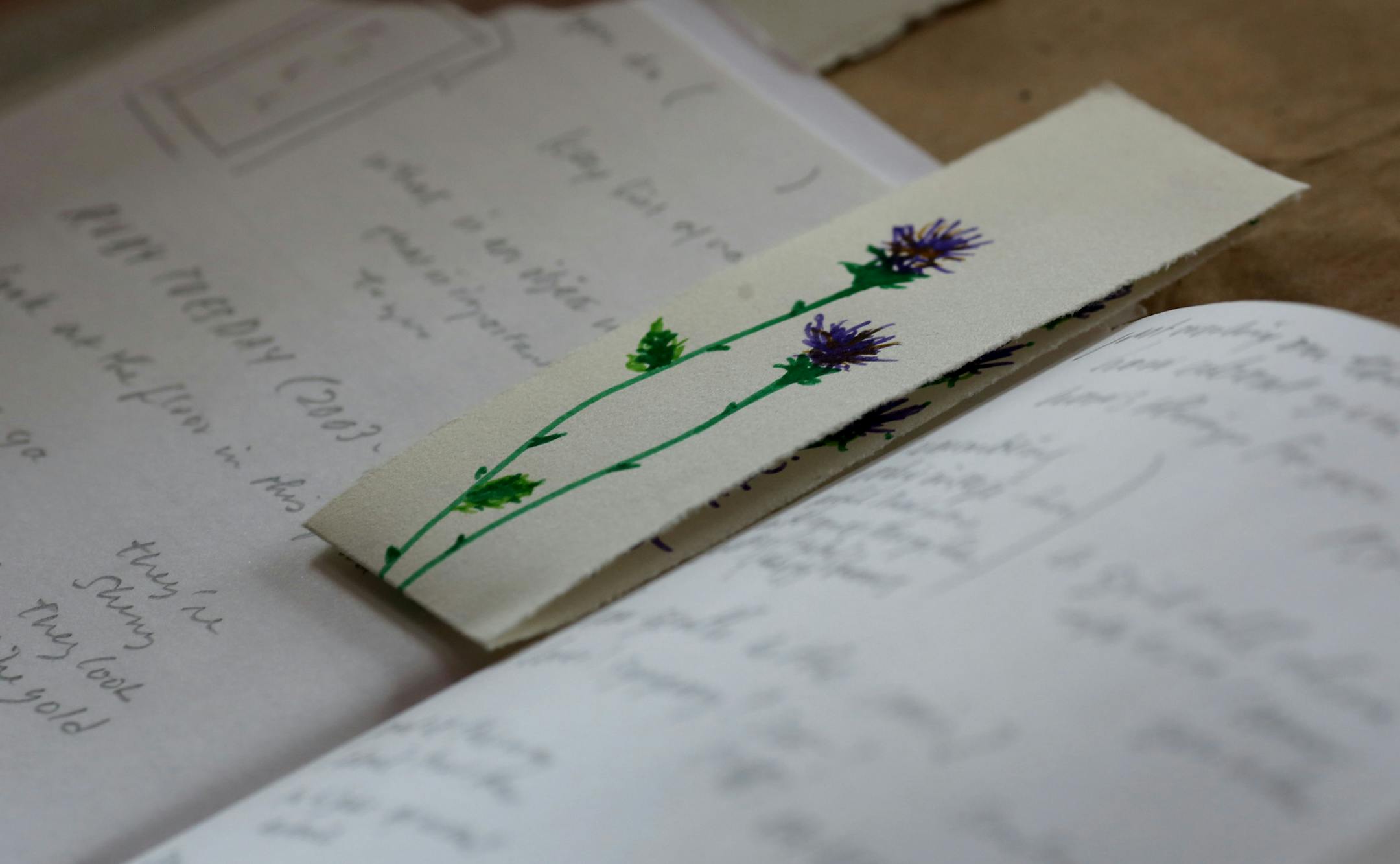 A detail from Eireann Lorsung's Book of Hours project at the Blue Moon Coffee Cafe.