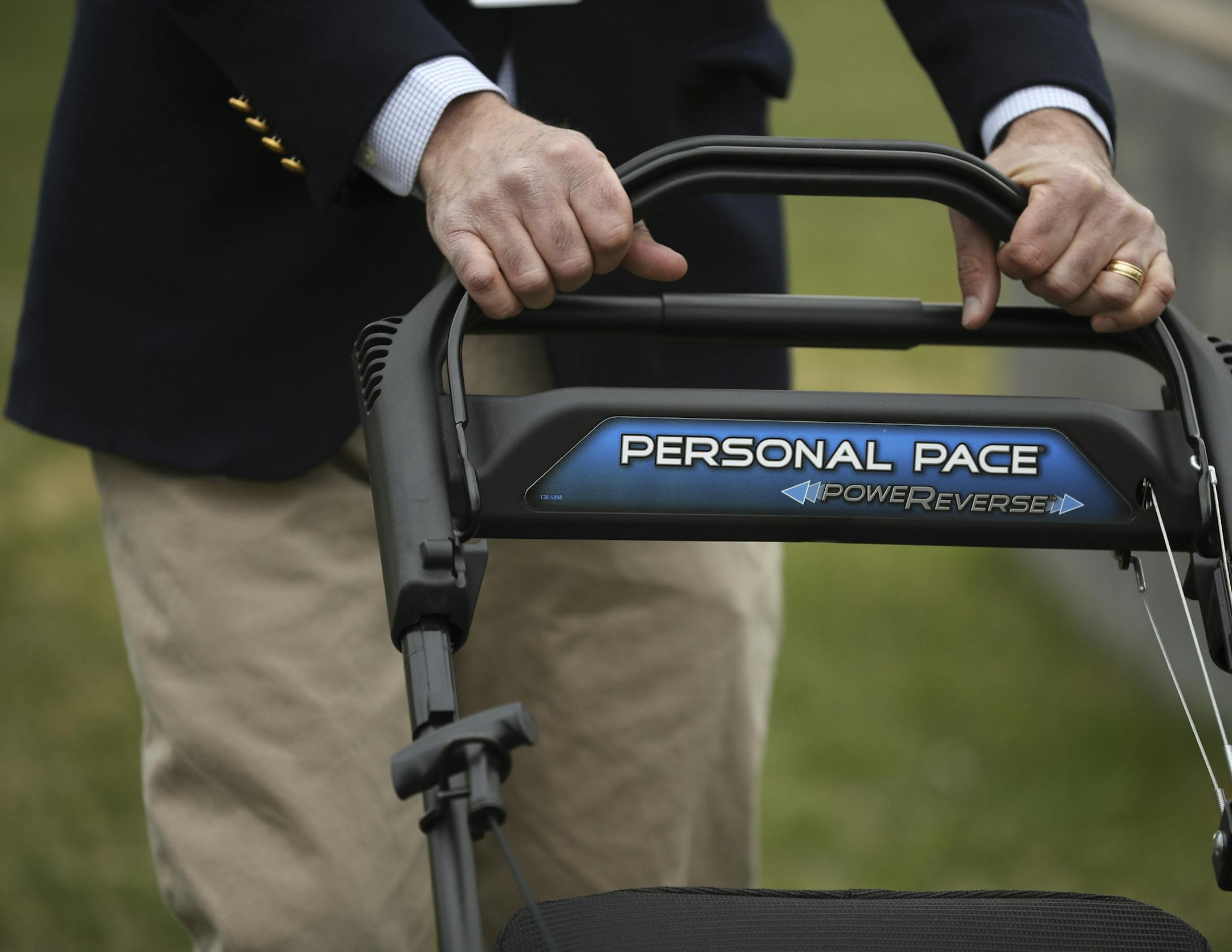 The unique floating handle that is the user interface for the new Toro walk-behind mower with Personal Pace and PowerReverse. ] JEFF WHEELER &#xef; jeff.wheeler@startribune.com We get a peek at a new Toro lawnmower with a feature users didn't know they wanted: PoweReverse. The Recycler also has a floating handle that is the interface for their existing Personal Pace technology. Toro's Senior Marketing Manager J. Wade Tollison demonstrated the walk-behind mower on the grounds of the Toro's Compan