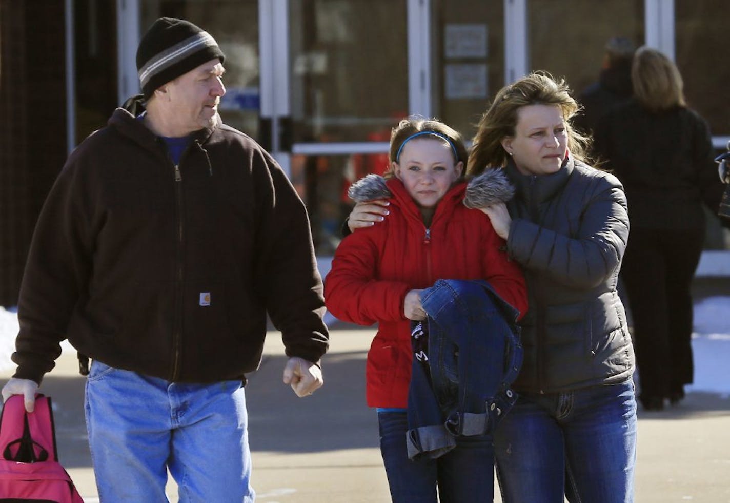 There was a scare in New Prague Wednesday morning when a 911 call about an active shooter proved unfounded. But the School District has notified parents that it calling off classes in all schools for the rest of the day. Here, parents came to pick up their children outside The New Prague Middle School.