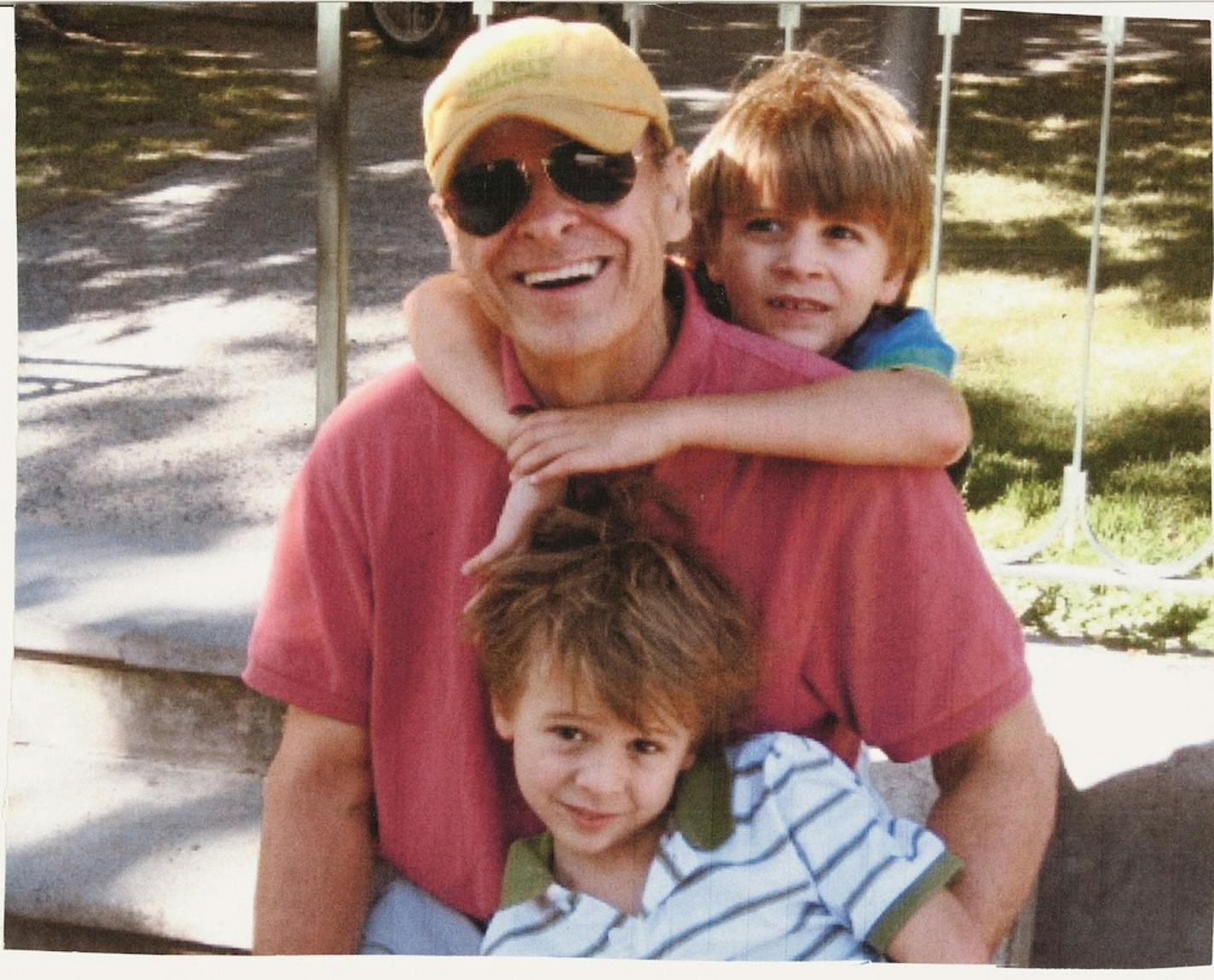 Tim O'Brien with his sons Timmy and Tad, who are now 16 and 14.