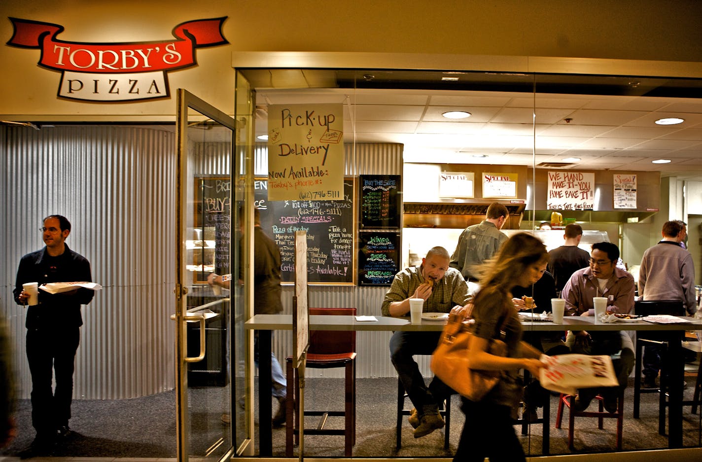 Torby's Pizza sits right in the skyway; diners can take their pizza to go or eat at the counter.