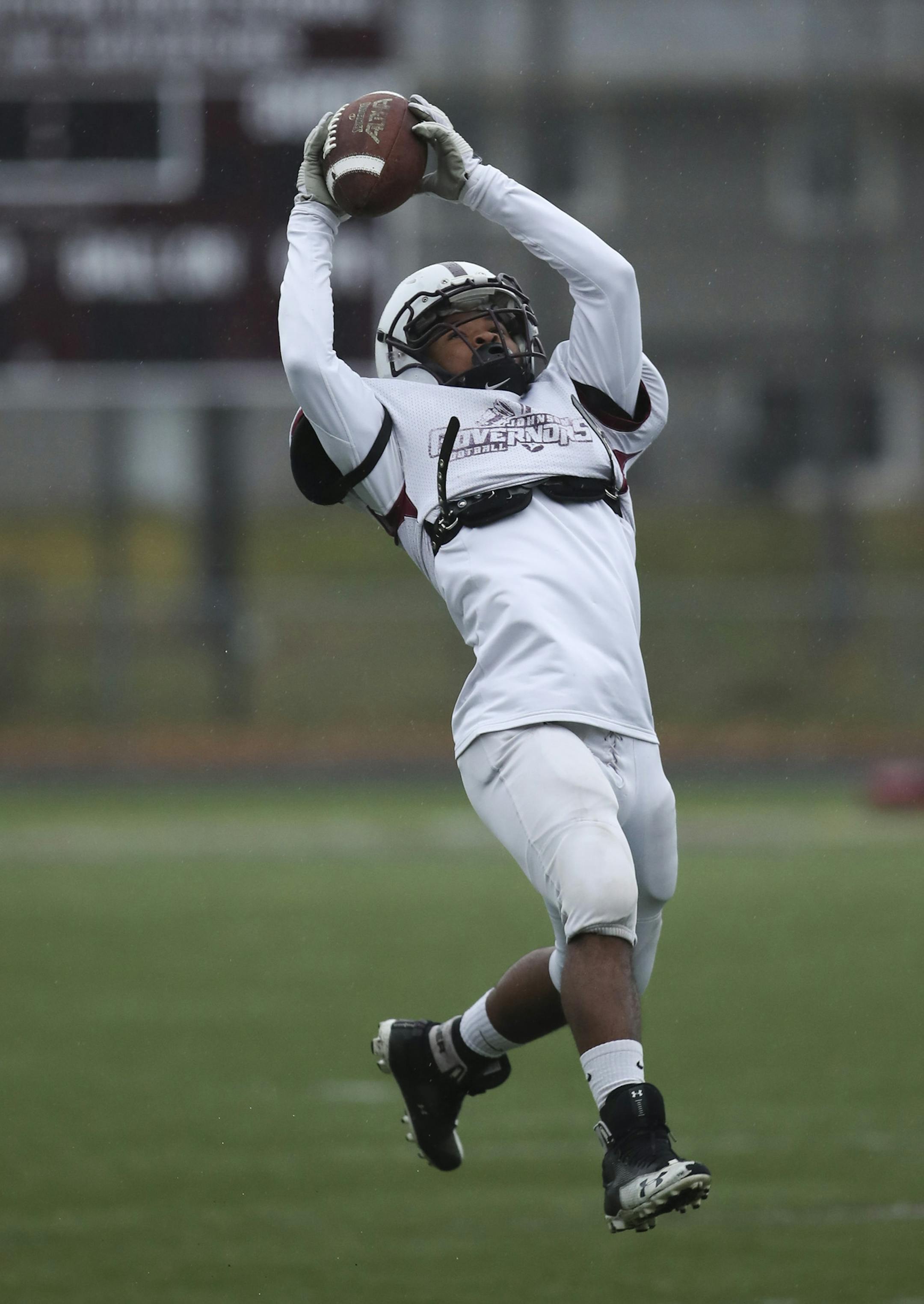 Johnson linebacker Rance Jones leapt for a pass during defensive drills at practice Monday. ] JEFF WHEELER ï jeff.wheeler@startribune.com St. Paul Johnson is the first St. Paul public school team to reach the football state tournament since 1981. The Governors practiced in the rain after school Monday afternoon, November 5, 2018 in St. Paul.
