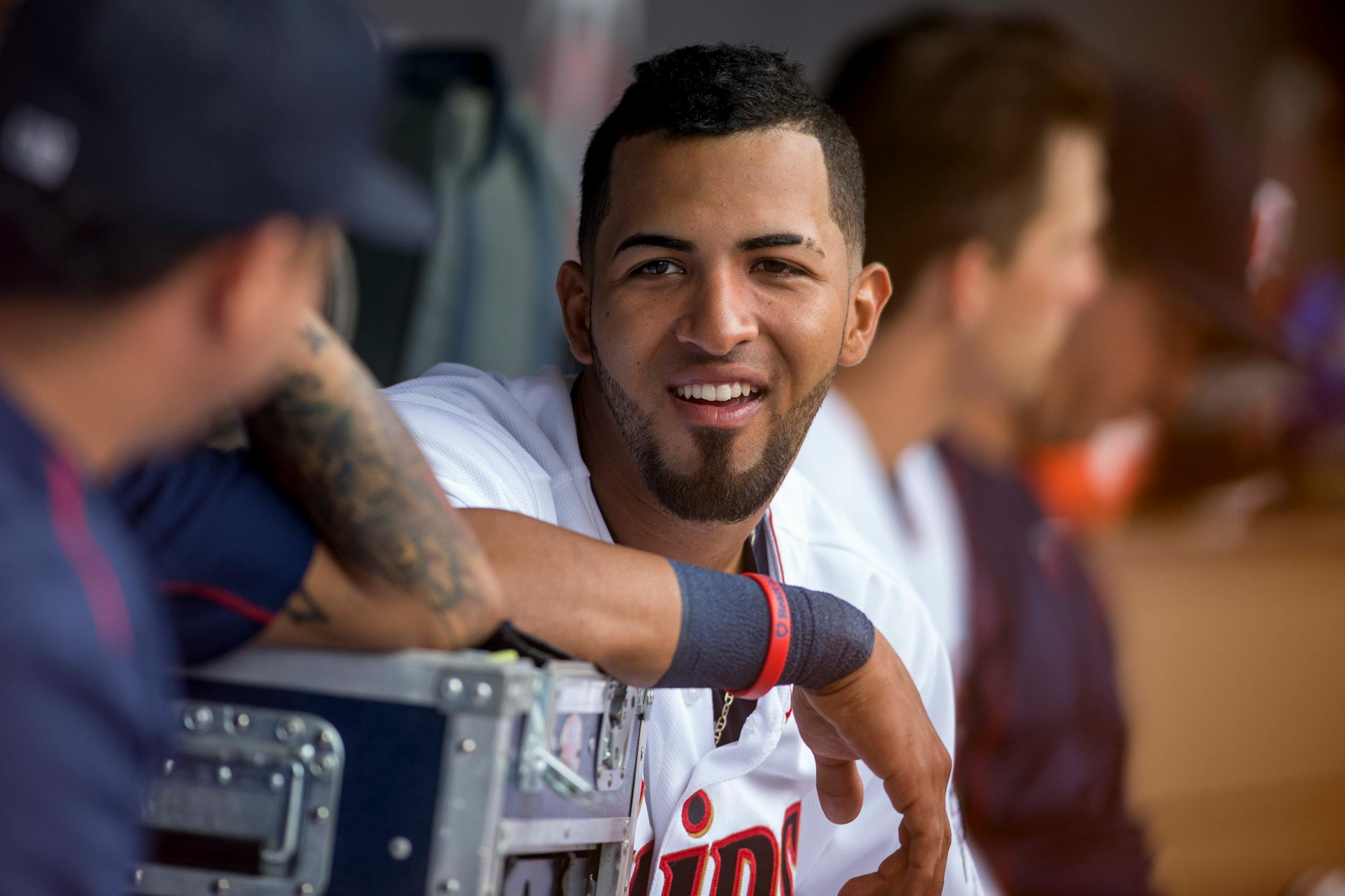 Minnesota Twins' Eddie Rosario talks in the dugout during a baseball game with the Chicago White Sox on Sunday, Sept. 4, 2016, in Minneapolis.